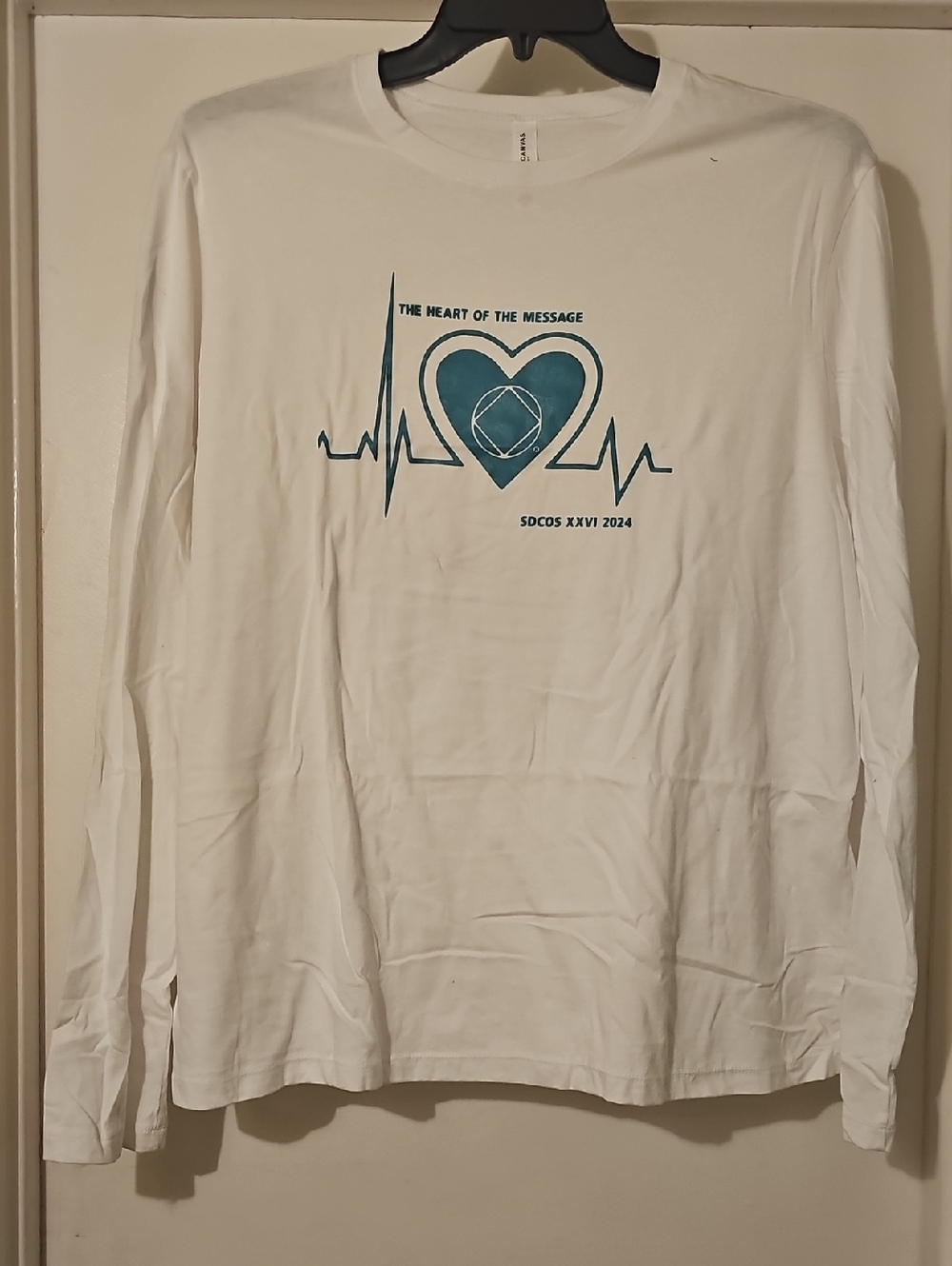 NA Circle Of Sisters 2024 White Long Sleeve Tee with Teal Heart Graphic Tote 10